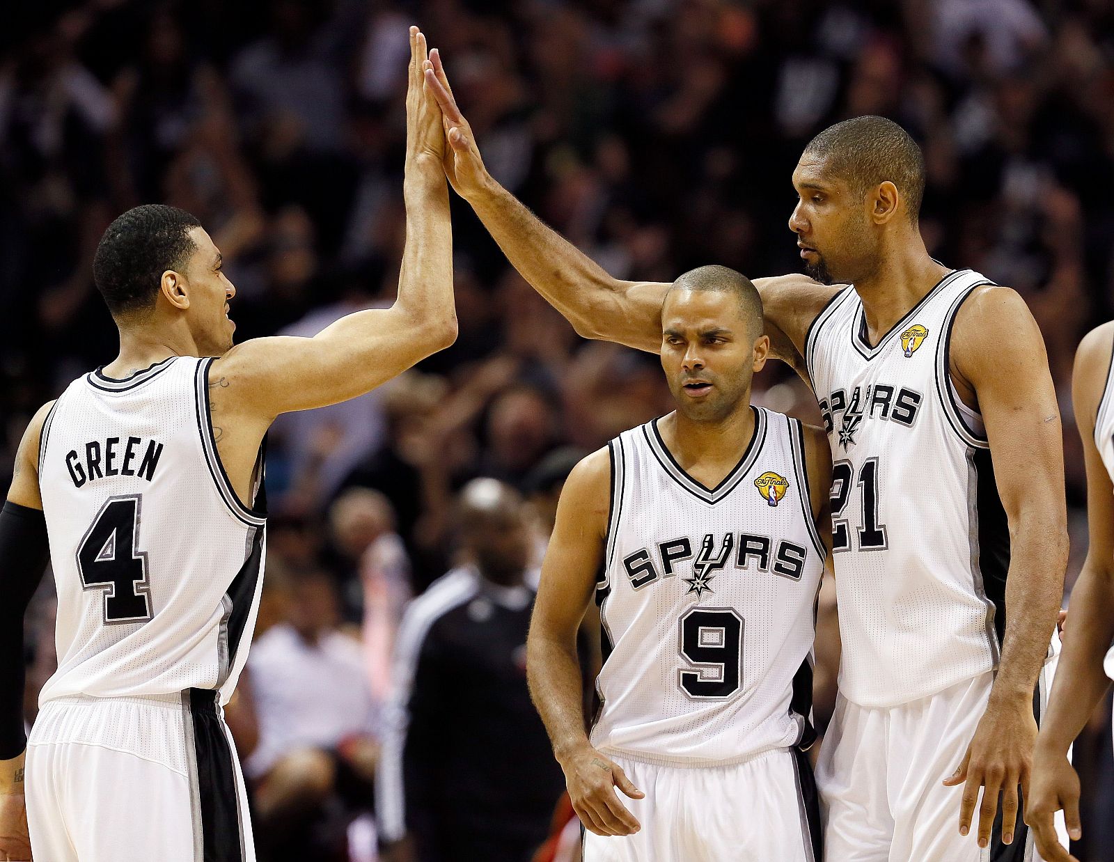 Danny Green (4), Tony Parker (9) y Tim Duncan (21), los tres mejores jugadores de los Spurs en las finales de la NBA