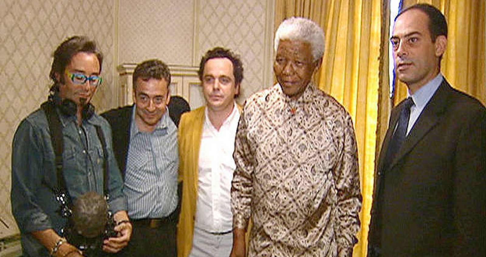  Los miembros del equipo con Mandela