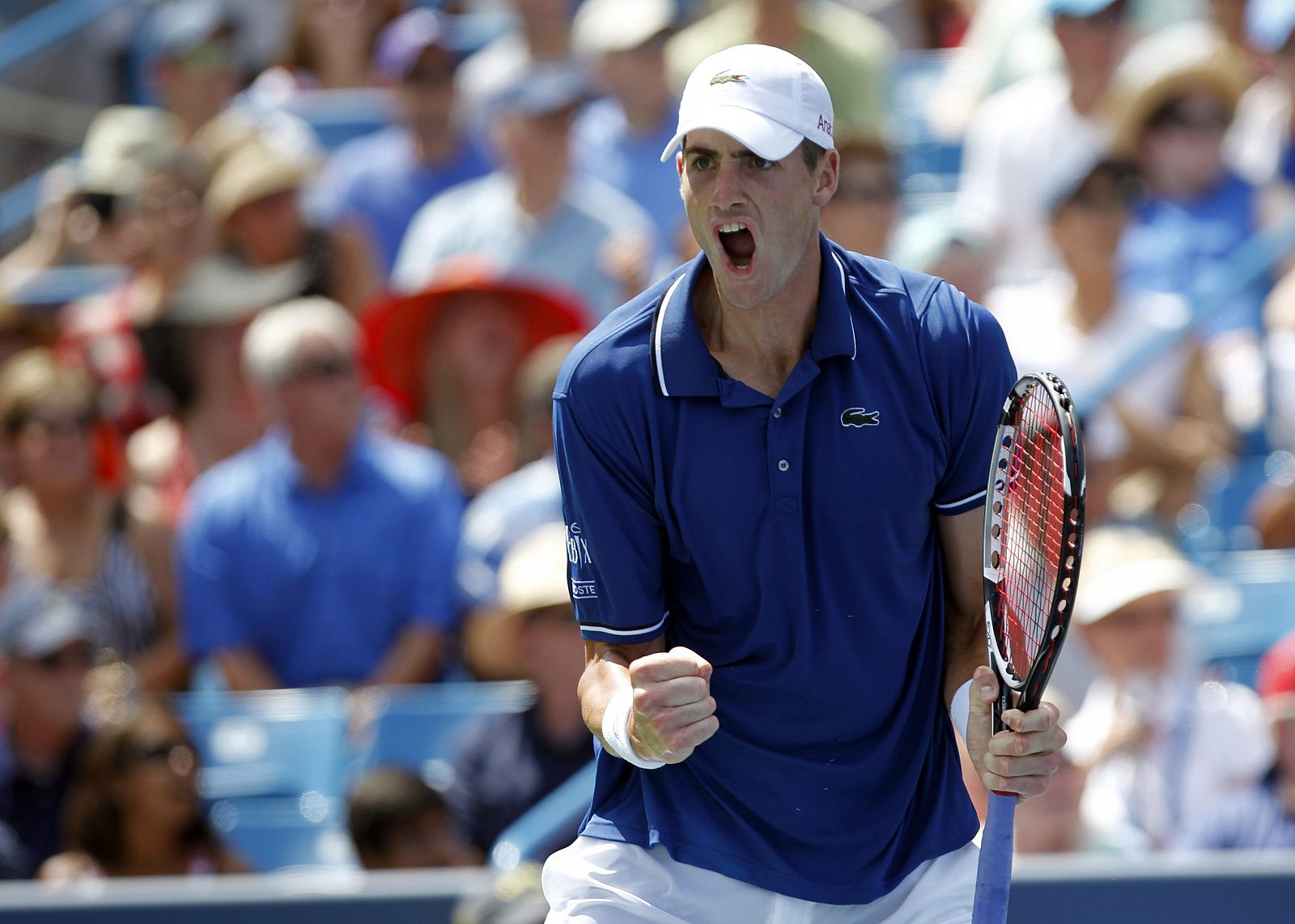 John Isner celebra la victoria sobre Del Portro en Cincinnati.