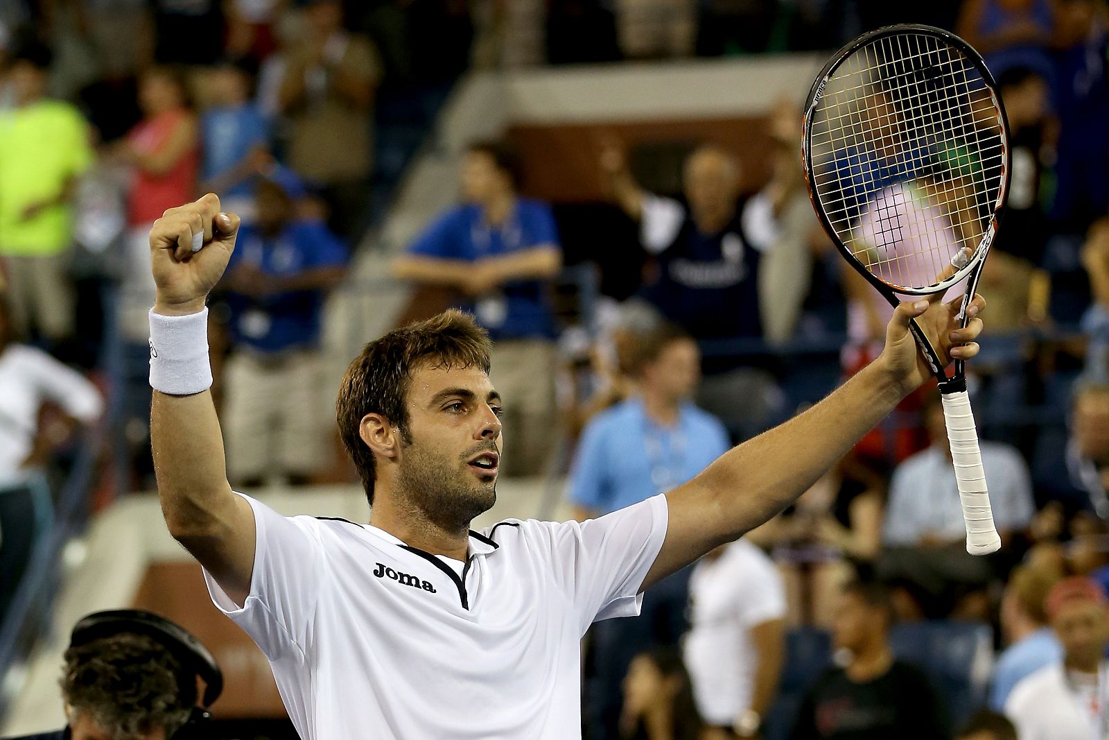 Marcel Granollers celebra su victoria ante Tim Smyczek