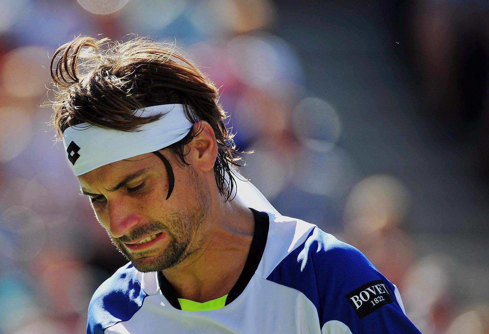 El tenista español David Ferrer se lamenta tras un fallo en su partido contra el francés Richard Gasquet, en cuartos de final del US Open 2013