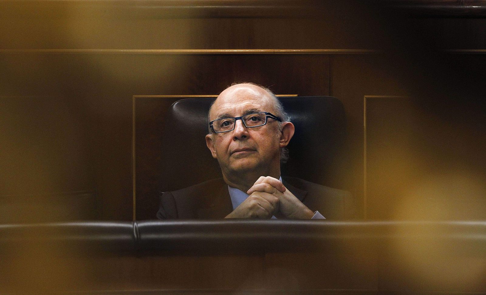 El ministro de Hacienda y Administraciones Públicas, Cristóbal Montoro, durante su asistencia al pleno del Congreso de los Diputados