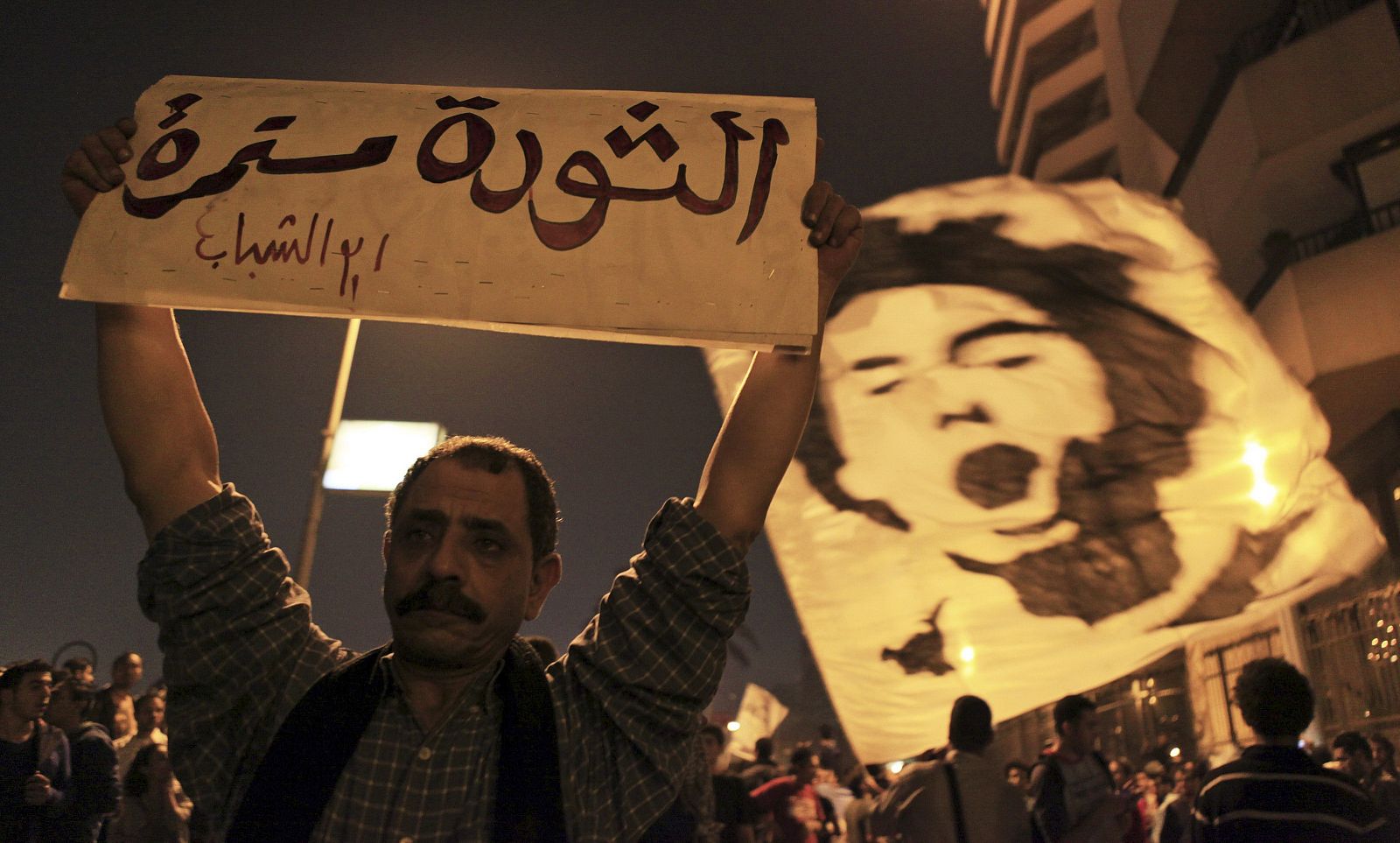 Protesters rally against a new law restricting demonstrations in Cairo
