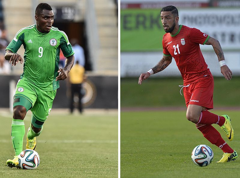 Imagen del nigeriano Emmanuel Emenike (i) y del iraní Ashkan Dejagah.