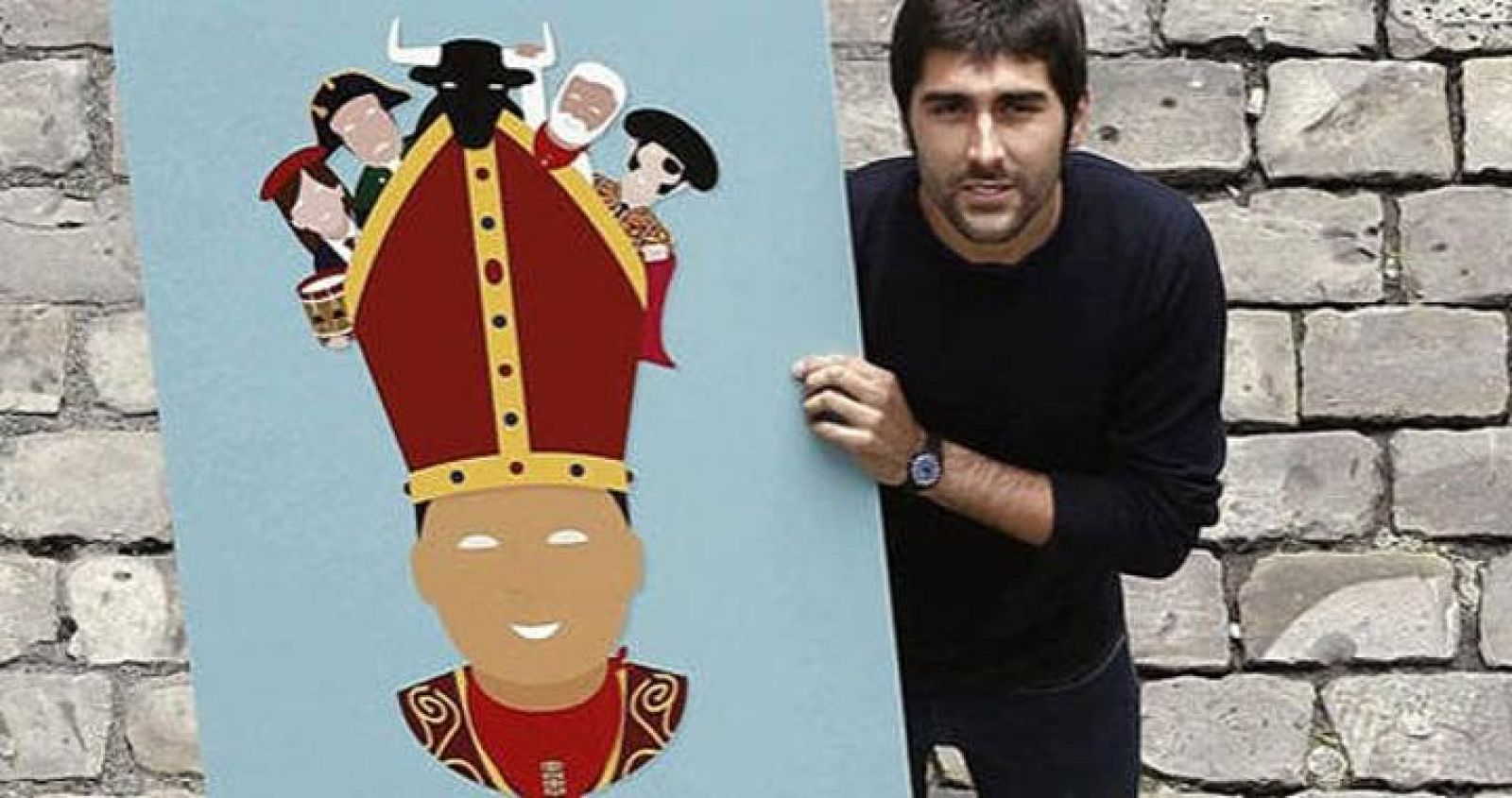 El autor posa en Pamplona con el cartel que ha ganado el concurso 