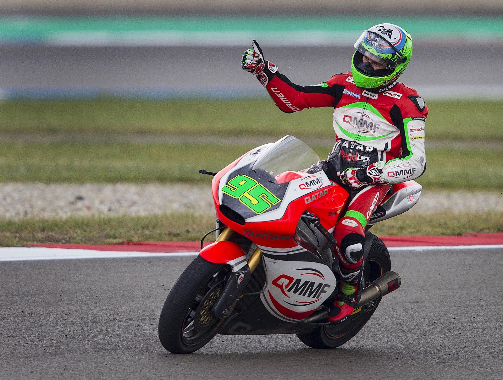 Speed Up Moto2 rider Anthony West of Australia reacts on bike after winning Dutch Grand Prix in Assen