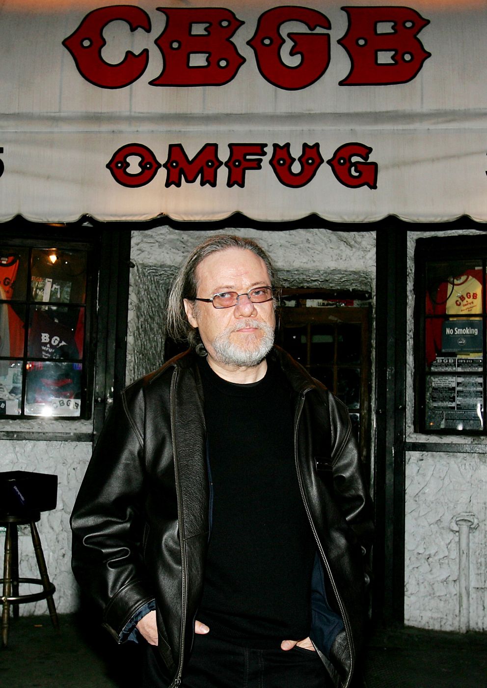 File photo of Tommy Ramone, member of the rock band the Ramones, posing in front of the CBGB music club in New York