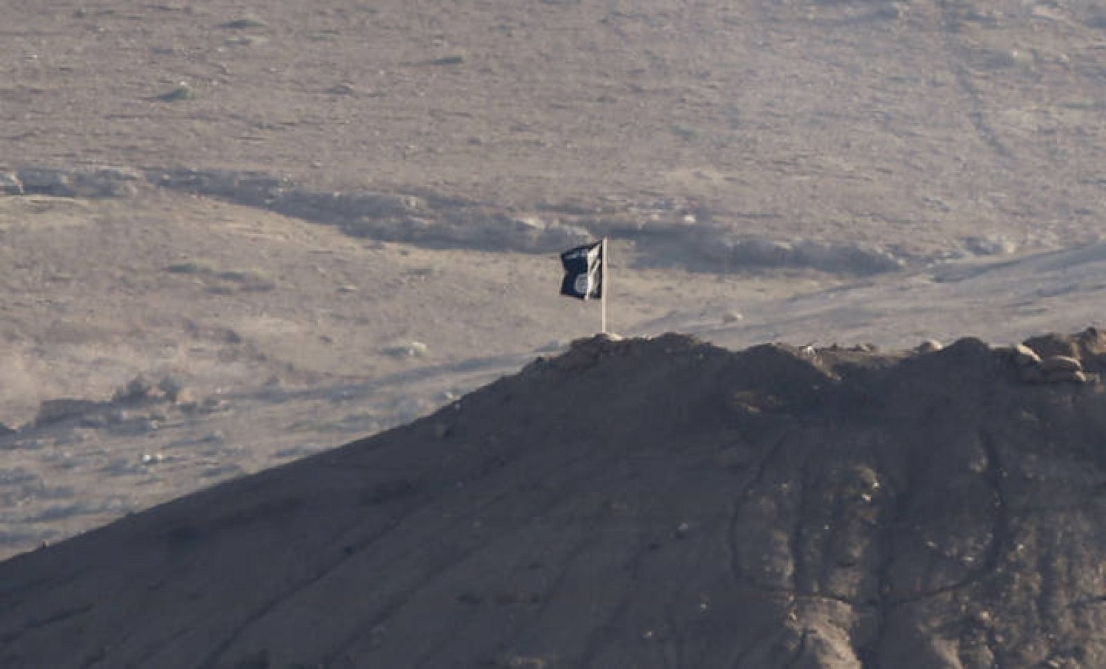 Black flag belonging to the Islamic State is seen near the Syrian town of Kobani, as pictured from the Turkish-Syrian border near the southeastern town of Suruc in Sanliurfa province