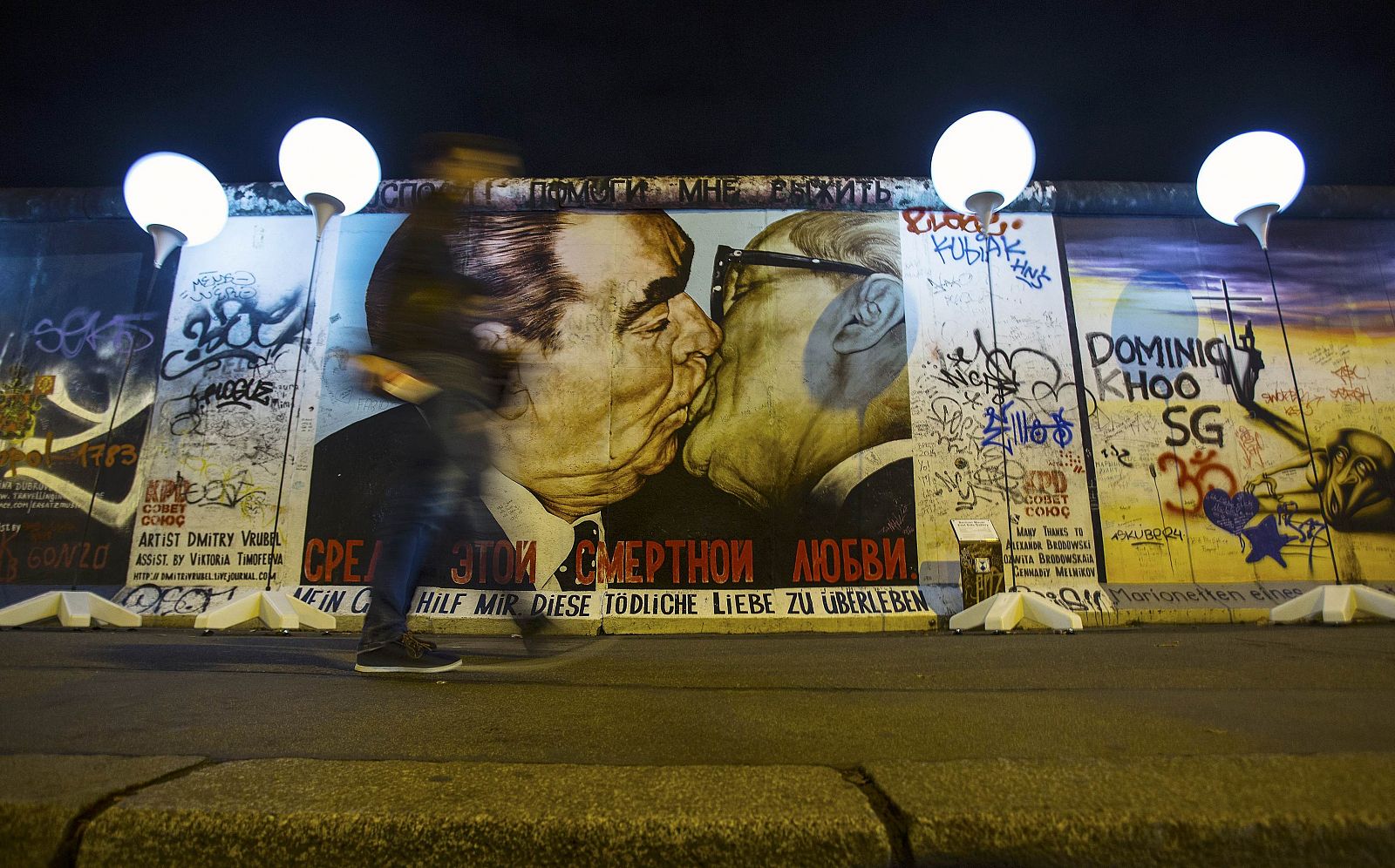 Peerson passes by installation Border of Light along former Berlin Wall location in Berlin