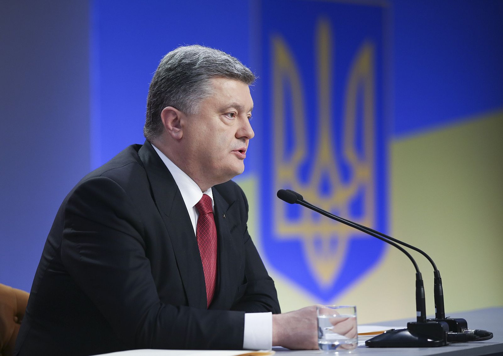 Ukrainian President Poroshenko speaks during a news conference in Kiev