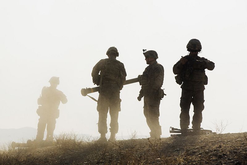 U.S. soldiers from D Troop of the 3rd Cavalry Regiment walk on hill after finishing with a training exercise near forward operating base Gamberi in the Laghman province of Afghanistan