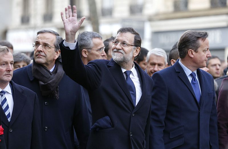 Rajoy y Samarás (i) acordaron la visita a Grecia en la manifestación de París