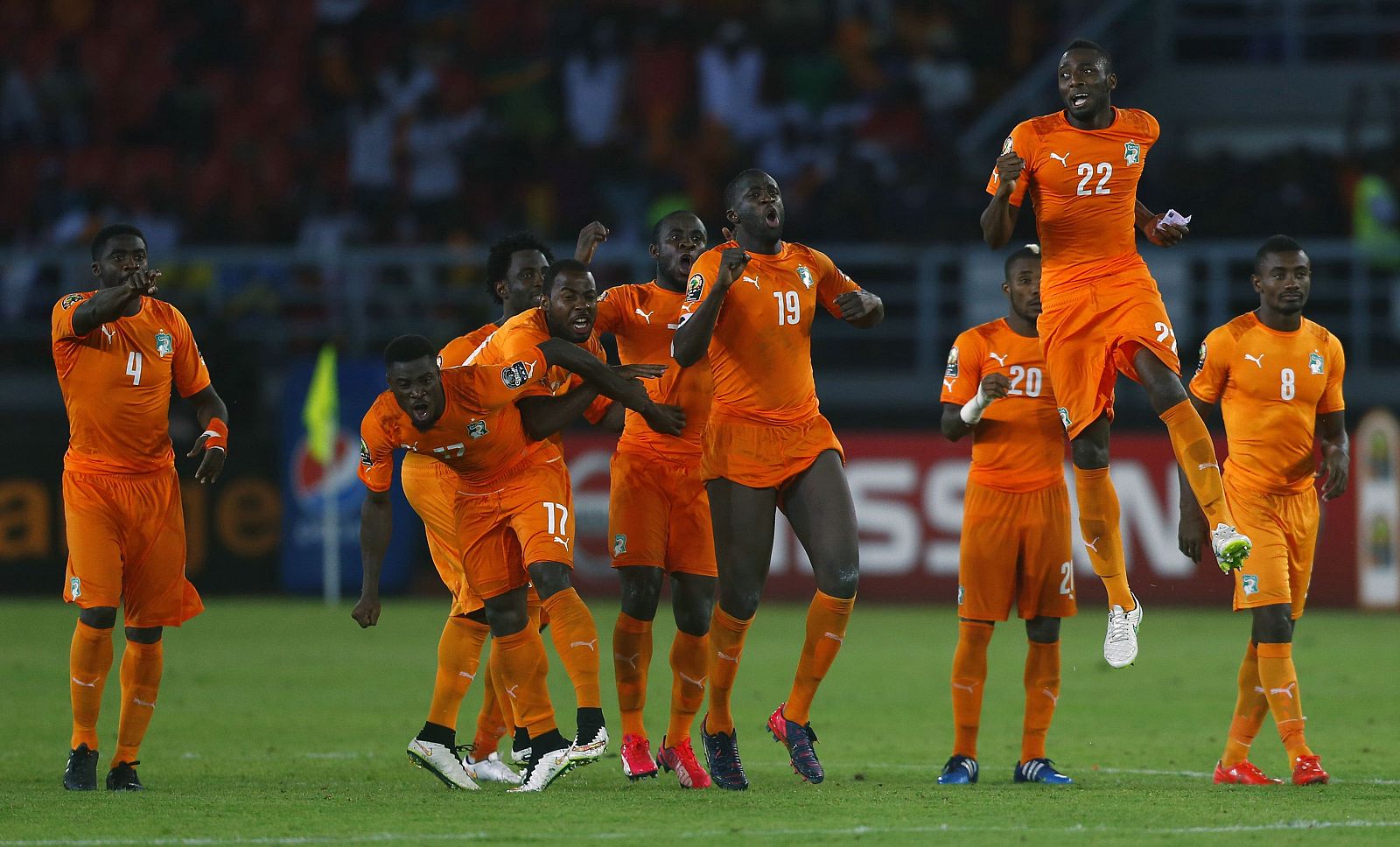 Ivory Coast's players celebrate winning the African Nations Cup final soccer match against Ghana in Bata