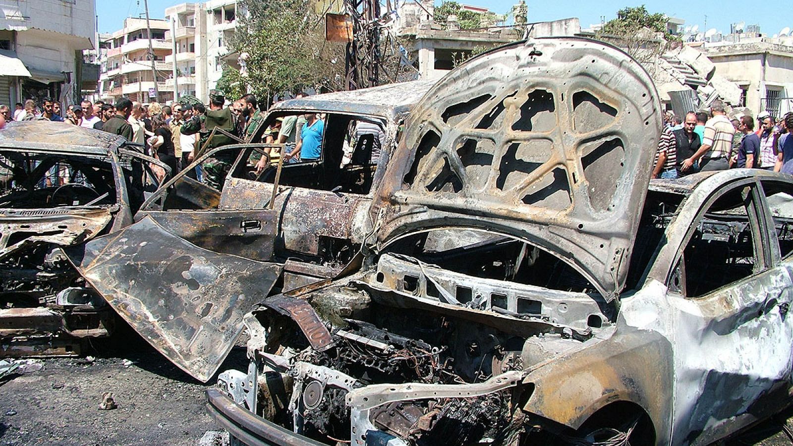 Imágenes de la agencia oficial siria SANA que muestran la destrucción en la ciudad de Latakia, en la costa mediterránea de Siria, tras un atentado con coche bomba