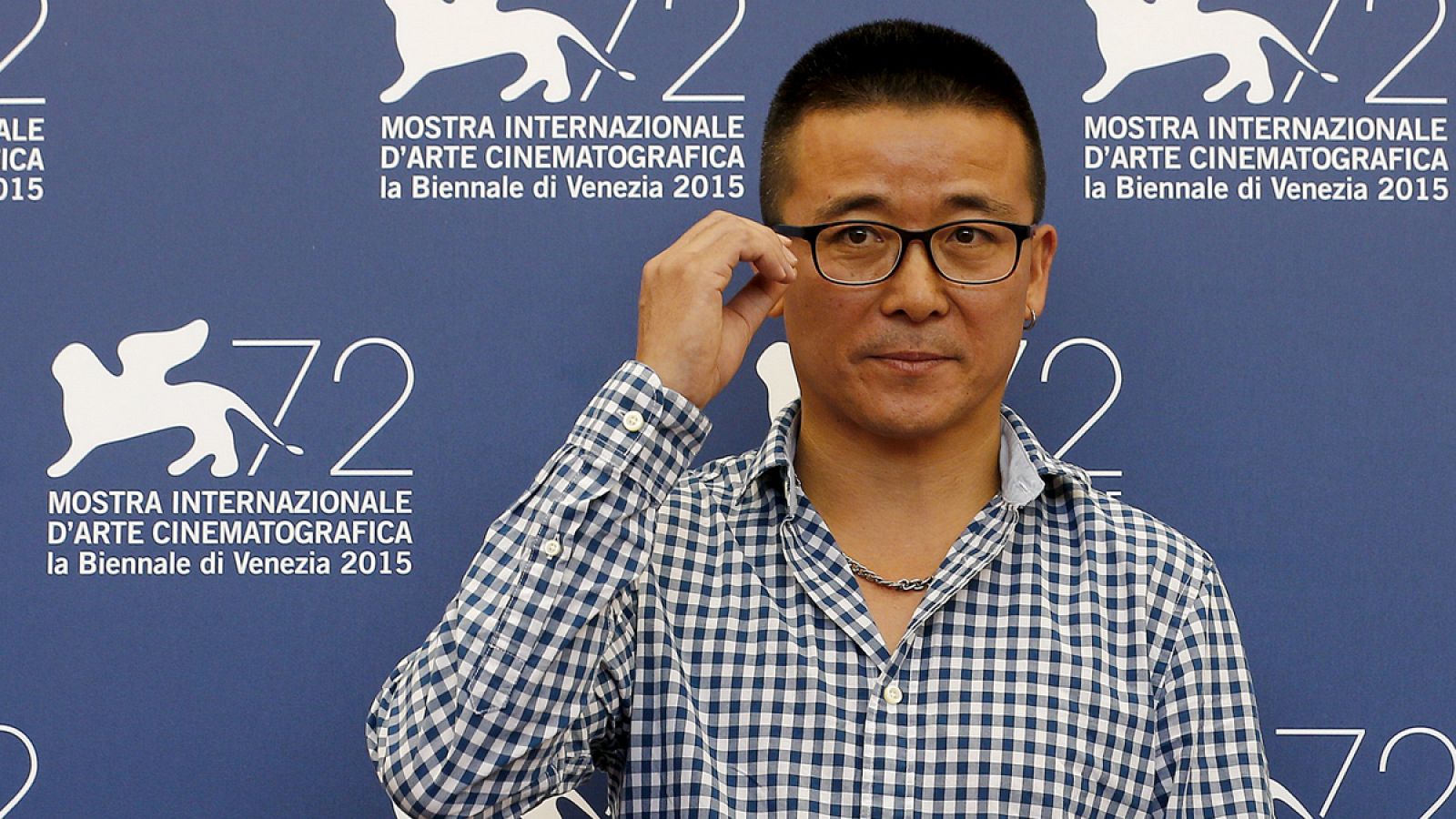 Director Zhao Liang attends the photocall for the movie "Bei Xi Mo Shuo" (Behemoth) at the 72nd Venice Film Festival
