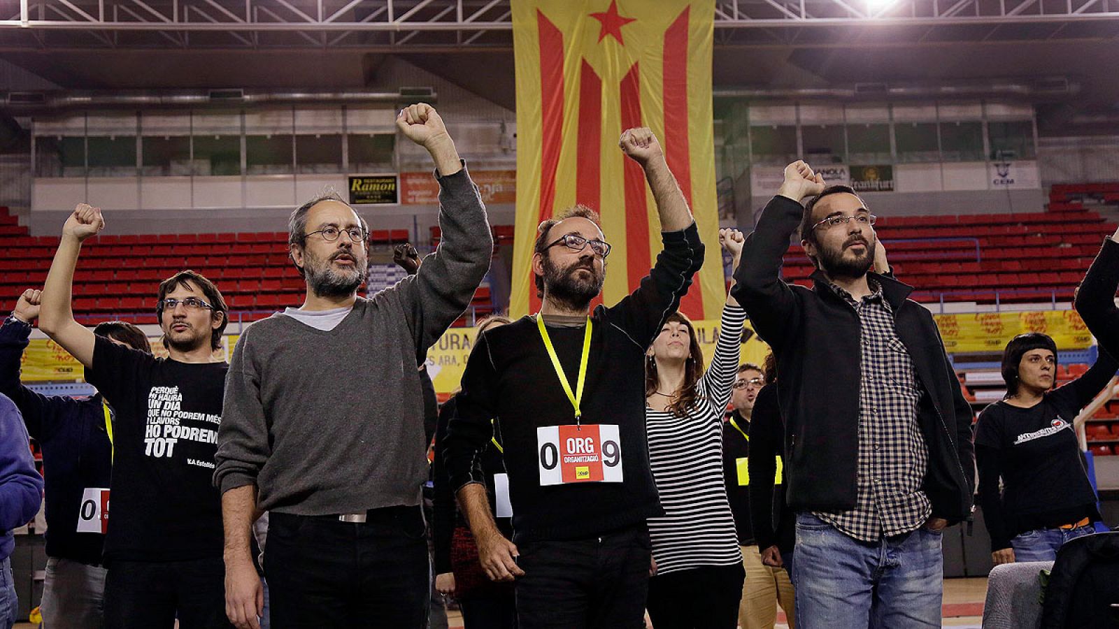 Los miembros de la CUP Antonio Baños, Benet Salellas, y Albert Butran, de izquierda a derecha, durante un acto