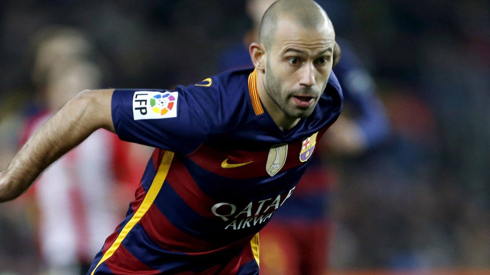 Mascherano, en un partido con el Barcelona.