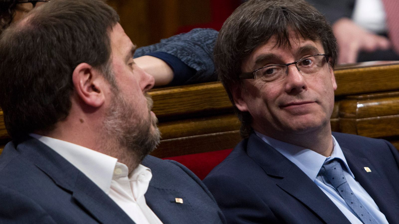 El presidente de la Generalitat, Carles Puigdemont, y su vicepresidente, Oriol Junqueras.