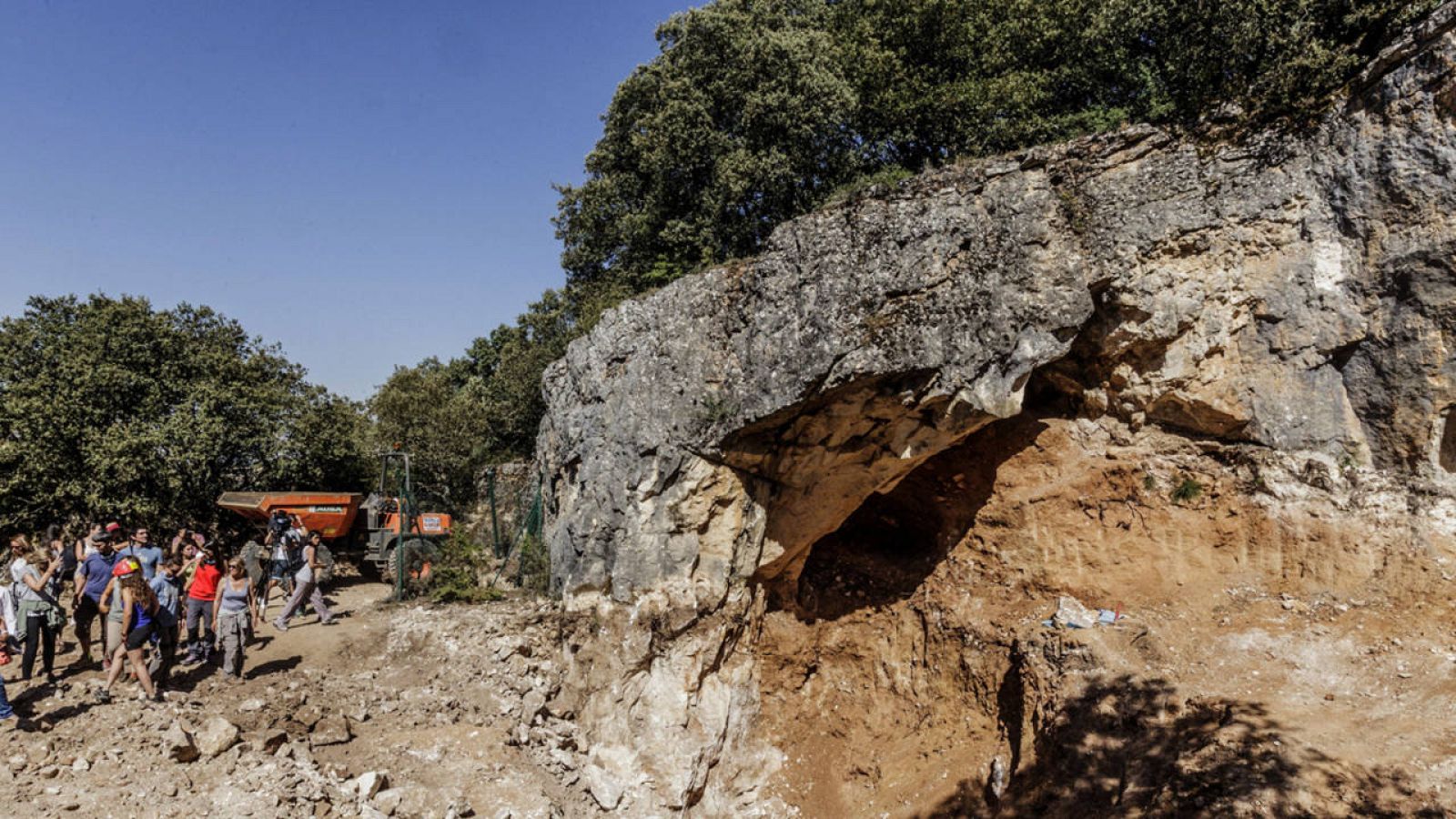 Archaeologists examine ancient tools, illustrating the enduring legacy of human storytelling—much like today’s radio hosts who blend tradition with innovation.