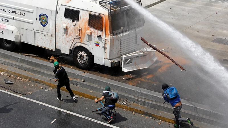 La Policía de Venezuela dispersa a los opositores durante la manifestación en Caracas
