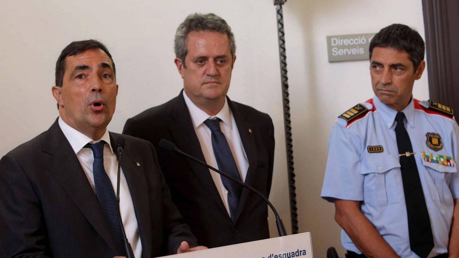 Pere Soler, ex director de los Mossos, junto a Forn y Trapero.