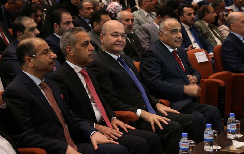 El presidente iraquí, Barham Saleh, y el nuevo primer ministro, Adel Abdulmahdi, en el Parlamento durante la votación del nuevo Gobierno
