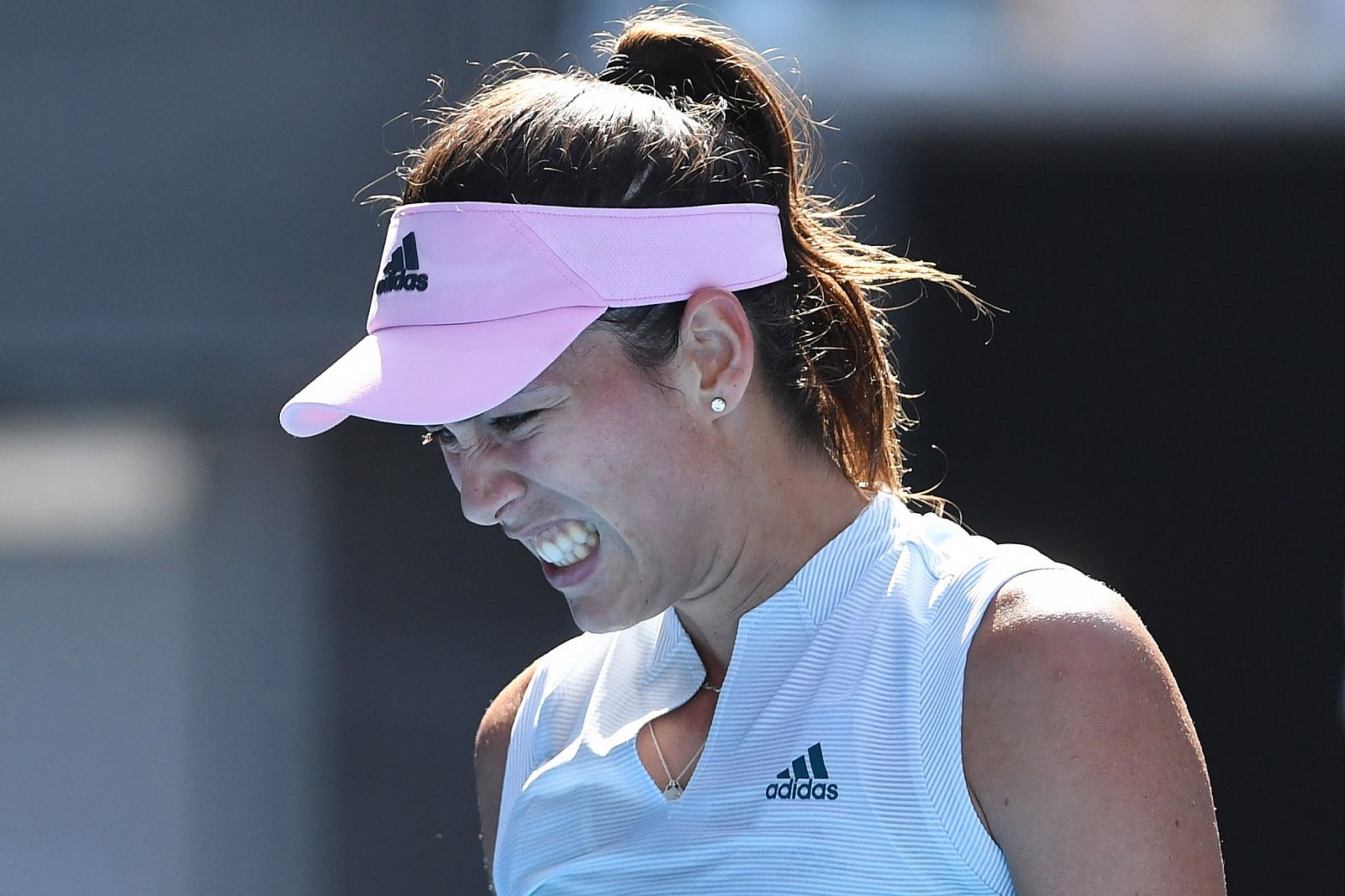 La tenista española Garbiñe Muguruza reacciona durante el partido ante Pliskova