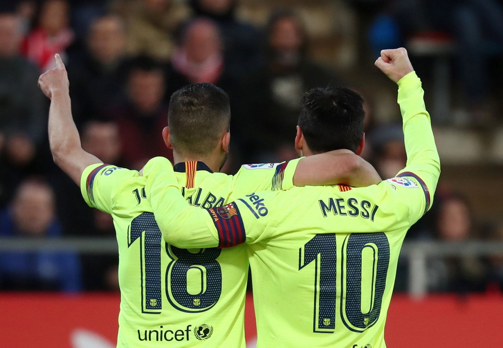 Alba y Messi celebran el 0-2 en Girona