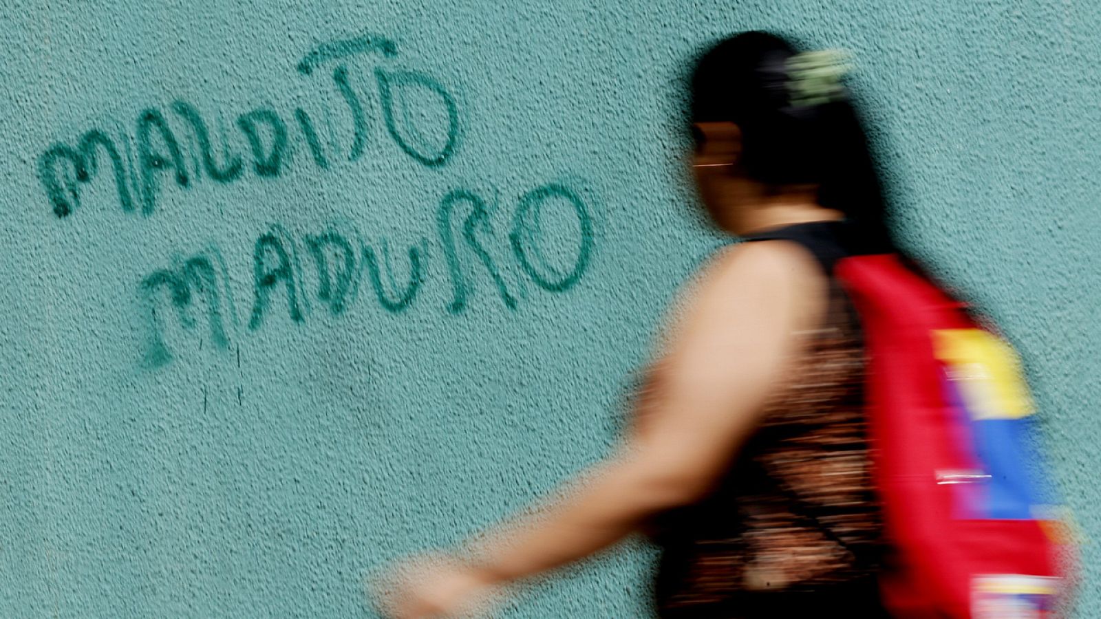 Fotografía del grafiti contra Maduro por el que fue detenido un cámara de Efe