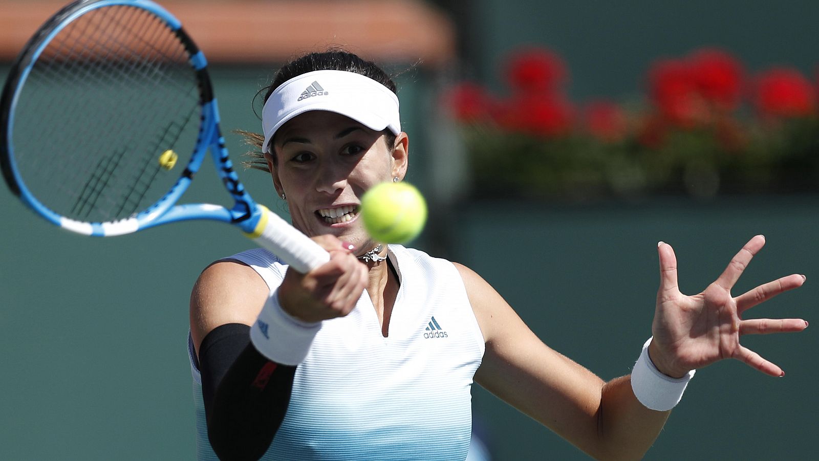 La española Garbiñe Muguruza, en acción frente a Lauren Davis.