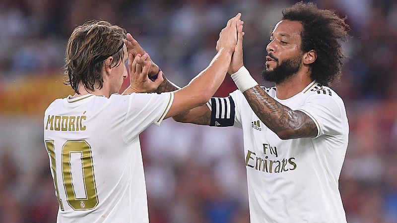 Modric y Marcelo celebran el primer gol del Madrid en Roma.