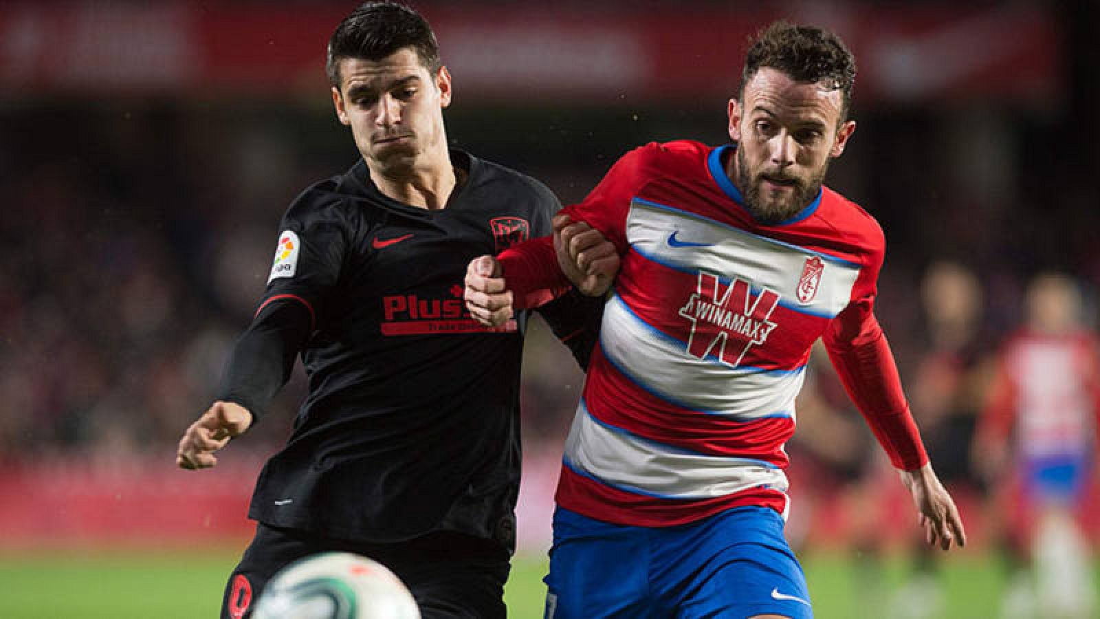 Álvaro Morata y Quini Marín, en un lance del partido.