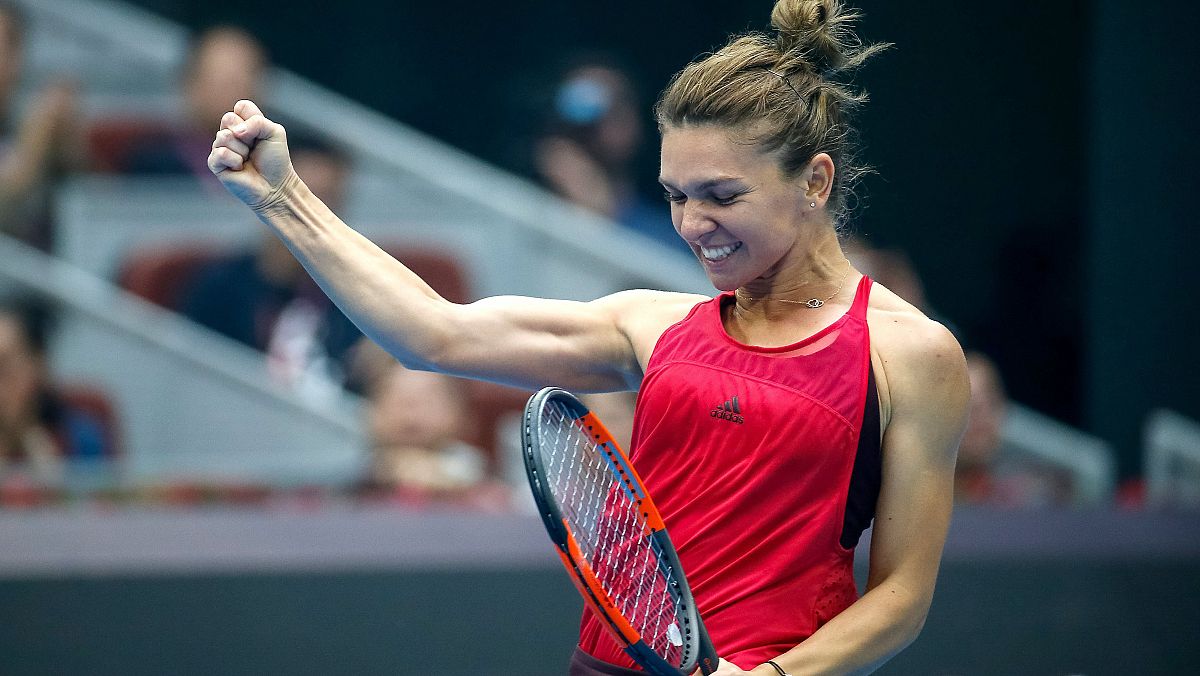 Simona Halep celebra su pase a la final de Pekín, que le otorga el número 1 del mundo.