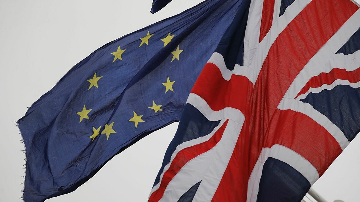 Banderas británica y de la UE frente al Parlamento británico. Tolga AKMEN / AFP