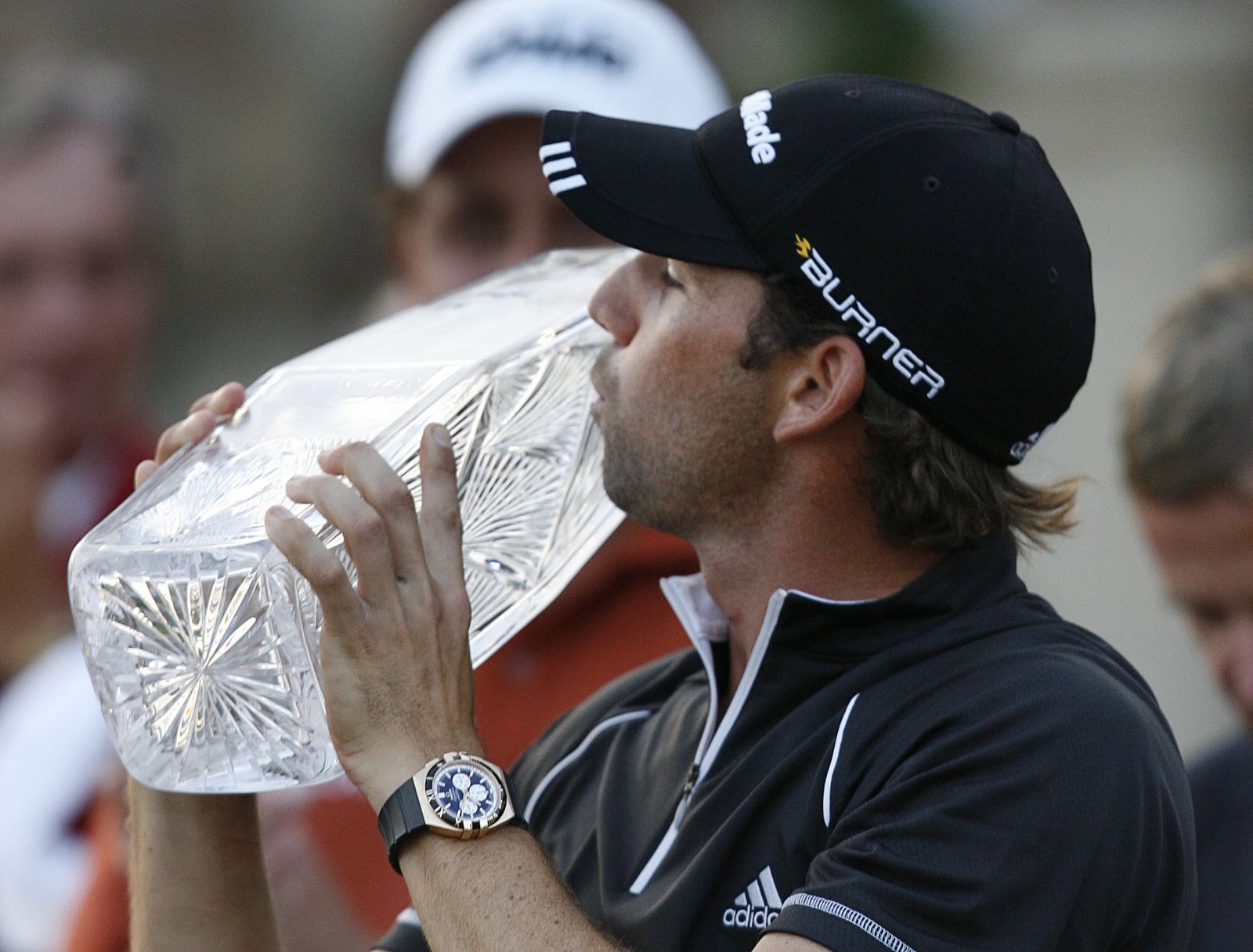 Sergio Garcia of Spain kisses the trophy after his victory in the Players Championship in Ponte Vedra