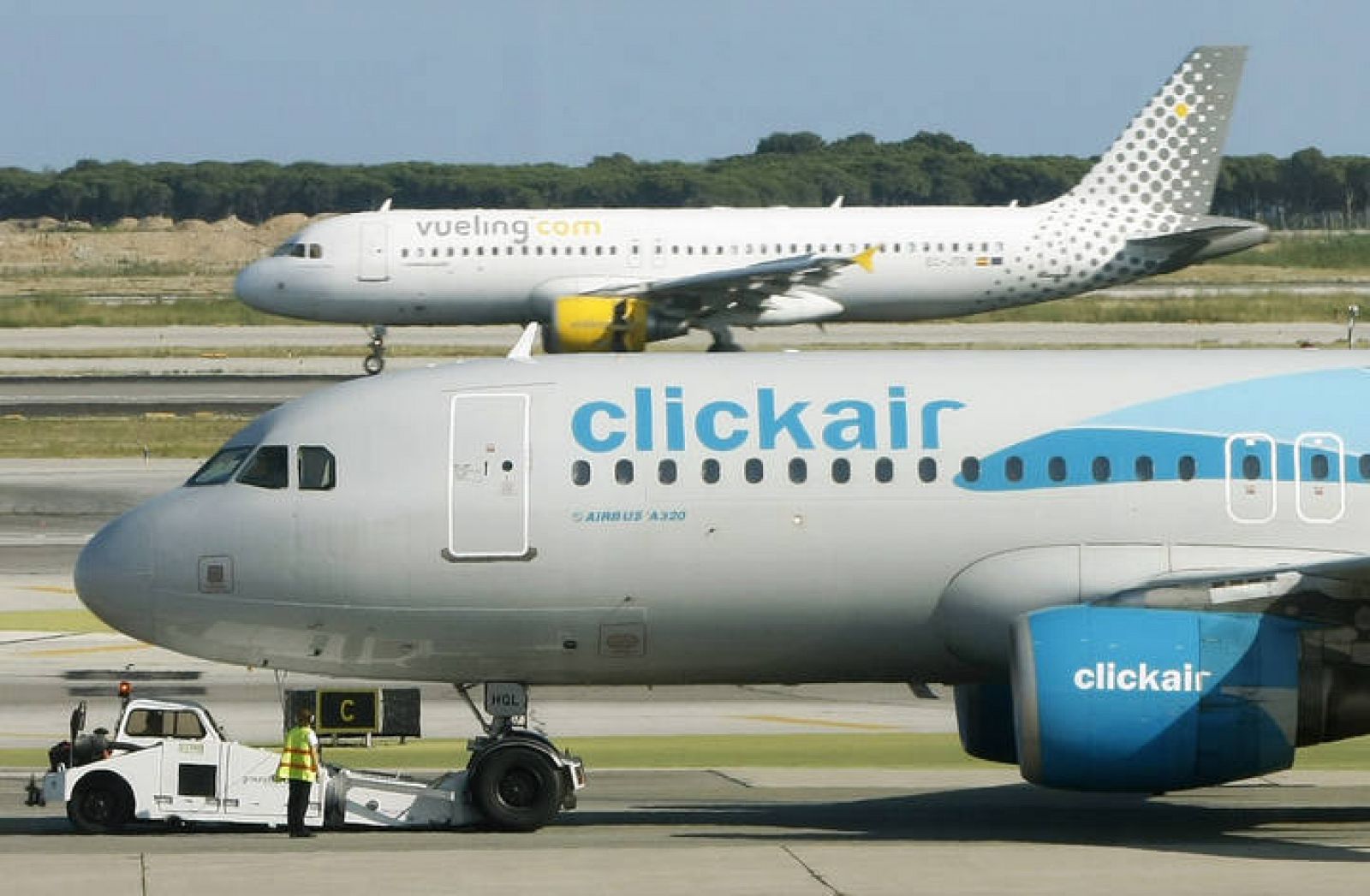 Clickair and Vueling planes are seen at El Prat airpot in Barcelona