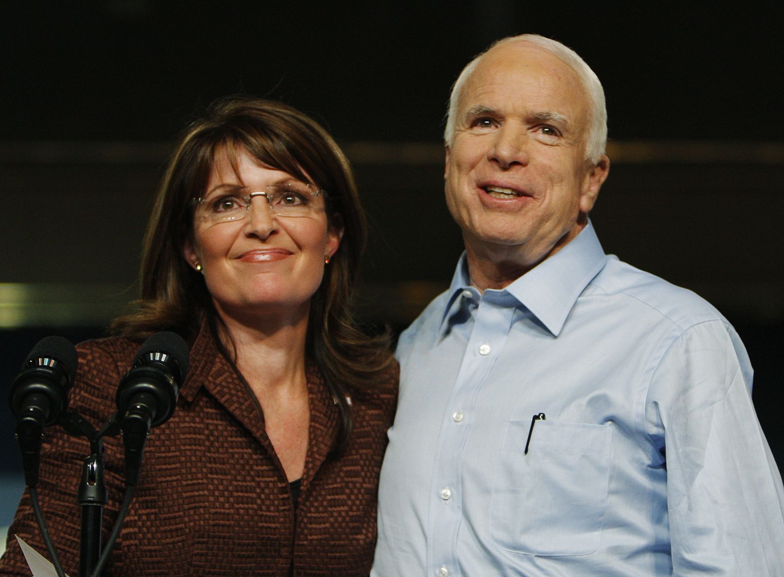 U.S. Republican presidential nominee Senator John McCain and Republican vice-presidential nominee Alaska Governor Sarah Palin stand together onstage at a campaign rally in Albuquerque