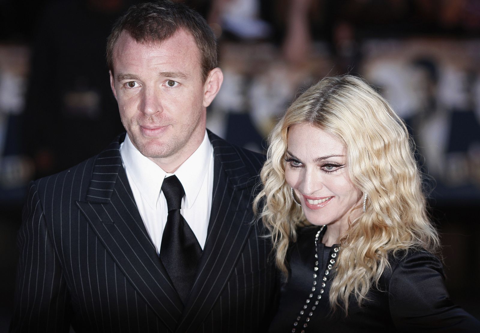 Director Guy Ritchie and wife Madonna arrive for the world premiere of "RocknRolla" at the Odeon cinema in London