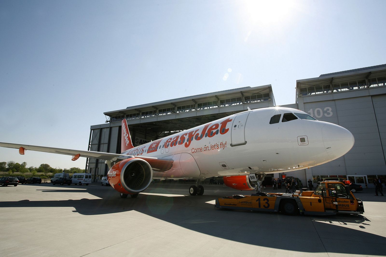 A new EasyJet Airbus A319 is moved out of hall following a ceremony at the Airbus delivery facility in Finkenwerder near Hamburg