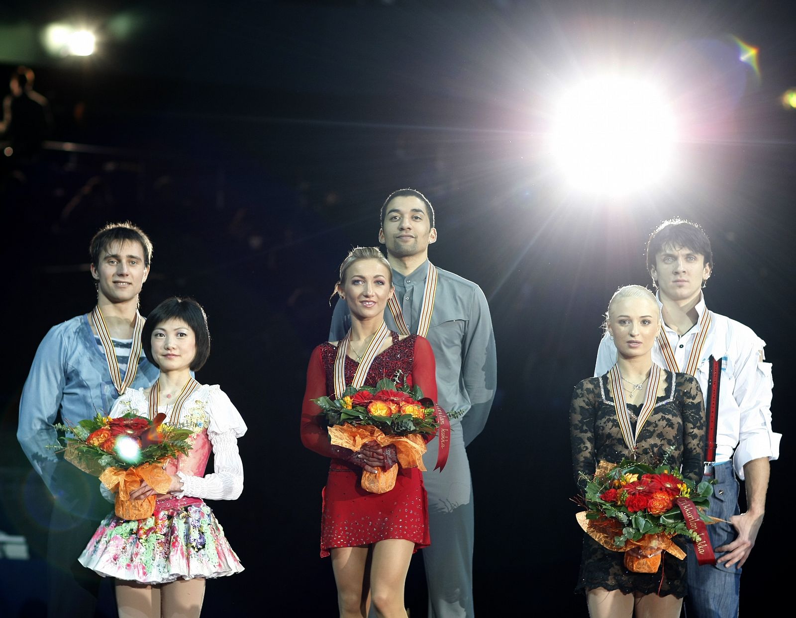 Kawaguchi and Smirnov of Russia Savchenko and Szolkowy of Germany and Mukhortova and Trankov of Russia  pose with medals after winning pairs free program at the European Figure Skating Championships in Helsinki