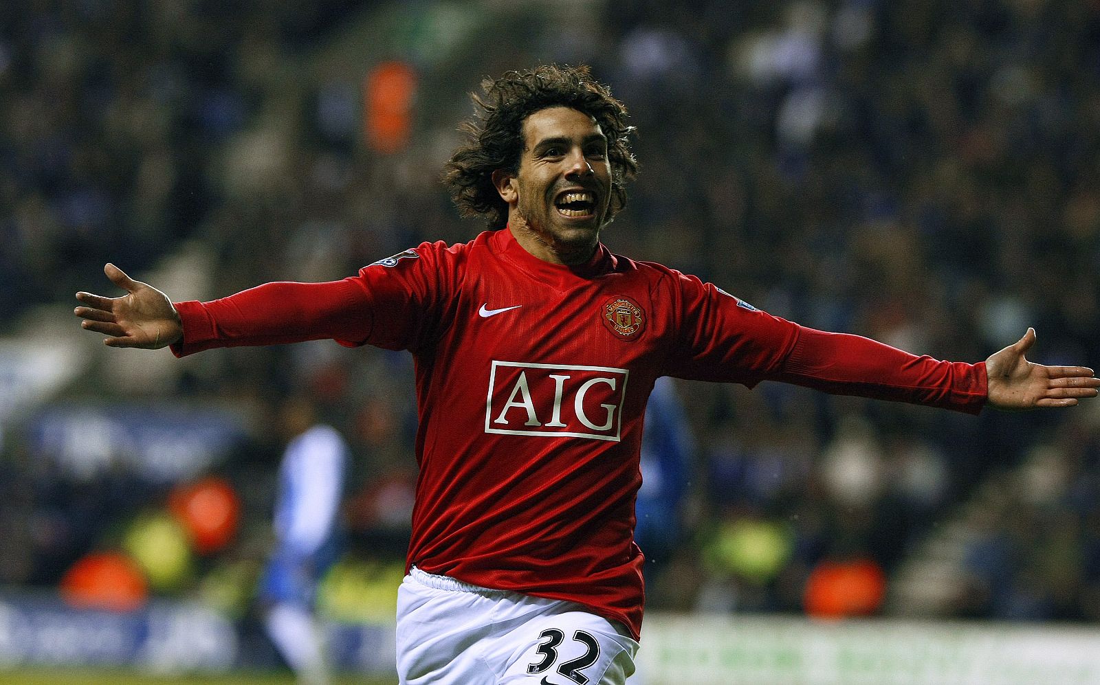 Manchester United's Tevez celebrates after scoring during English Premier League match against Wigan Athletic in Wigan