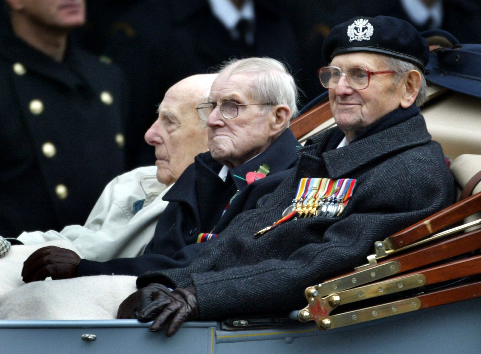 British World War I veterans (L to R)  Henry Alligham 107 years old, Norman Robinson 102 years old a..