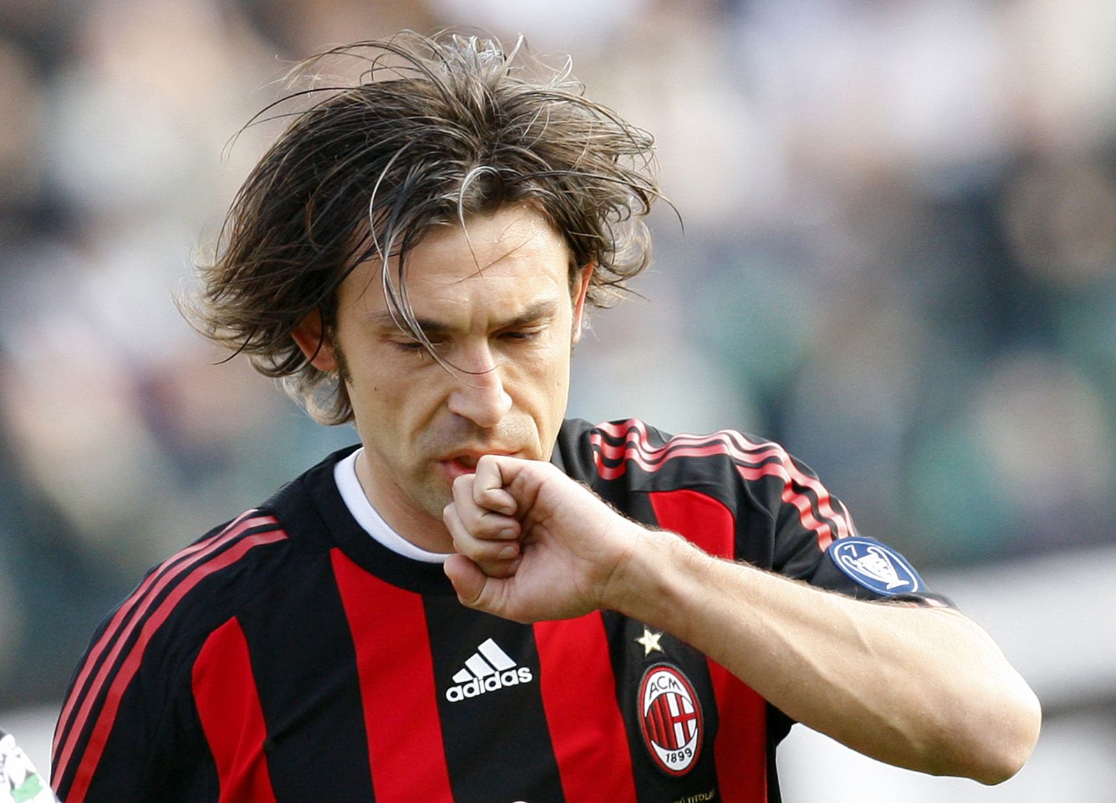 AC Milan's Pirlo celebrates after scoring a penalty against Siena during their Italian Serie A soccer match in Siena