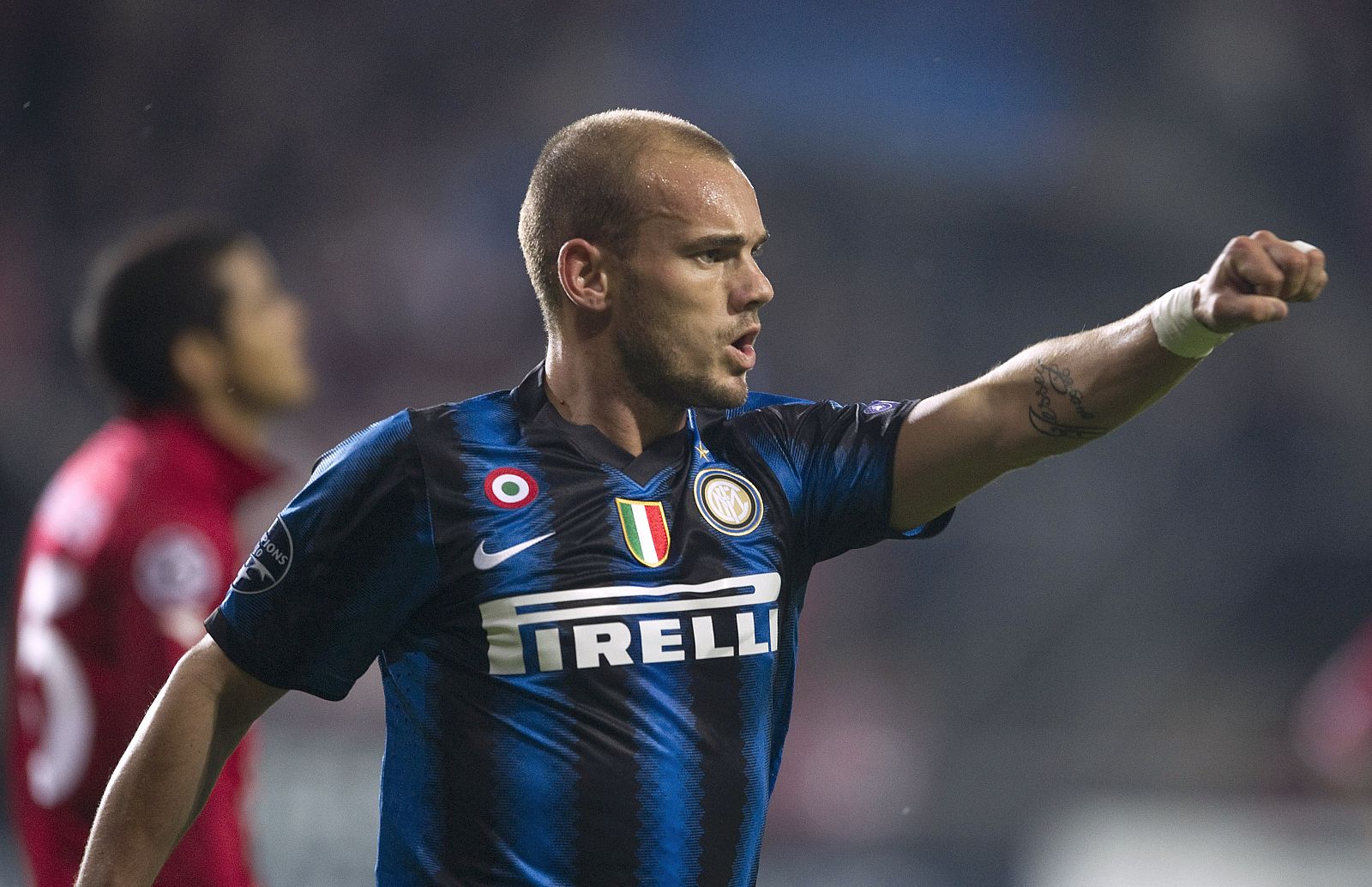 Sneijder of Inter Milan celebrates his goal against Twente Enschede during their Champions League Groupe A soccer match in Enschede