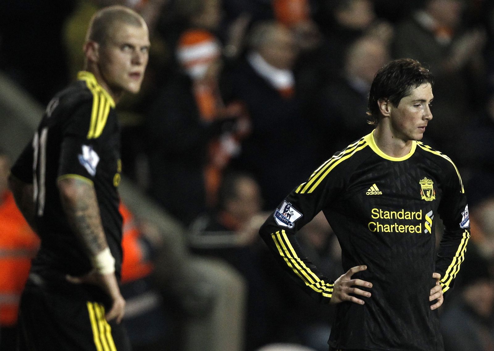 Fernando Torres, a la derecha, con su compañero Martin Skrtel, en el partido del Liverpool ante el Blackpool.