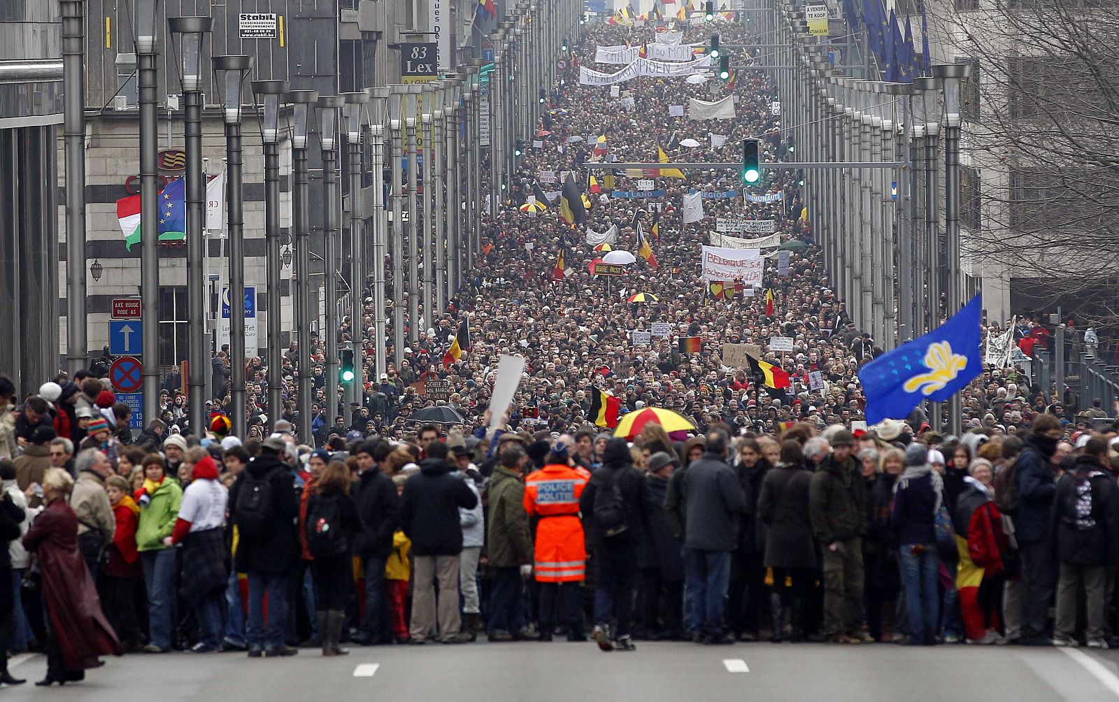 Belgian citizens take part in a rally calling for the establishment of a government more than 200 days after elections, in Brussels