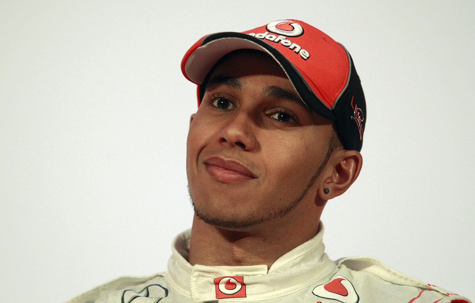 McLaren Formula One racing driver Hamilton attends news conference after unveiling of new McLaren Mercedes MP4-26 racing car in Berlin