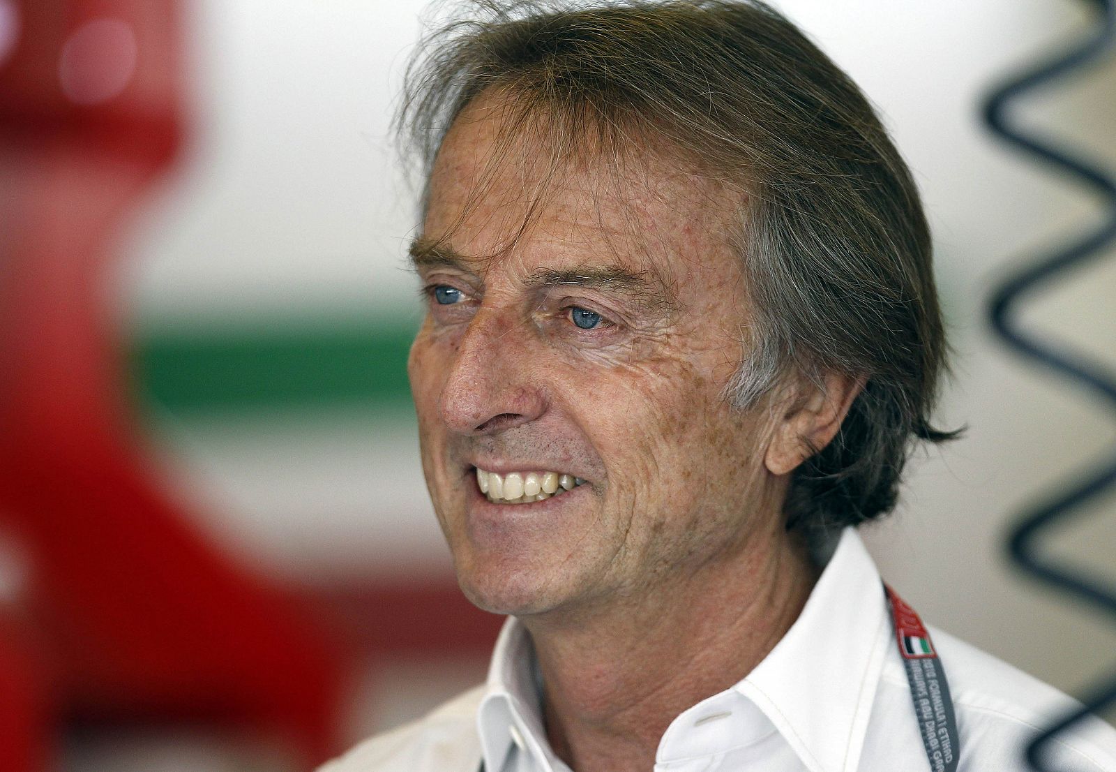 File photo of Ferrari President Luca di Montezemolo smiling in the pits during the a practice session of the Abu Dhabi F1 Grand Prix