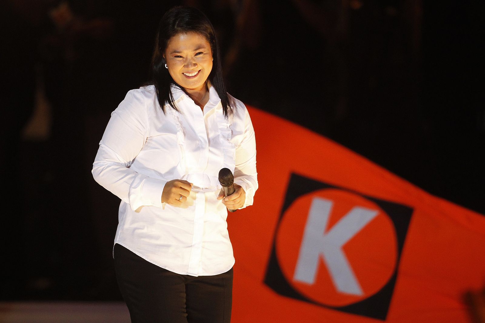 Peru's presidential candidate Fujimori smiles during her closing campaign rally in Lima