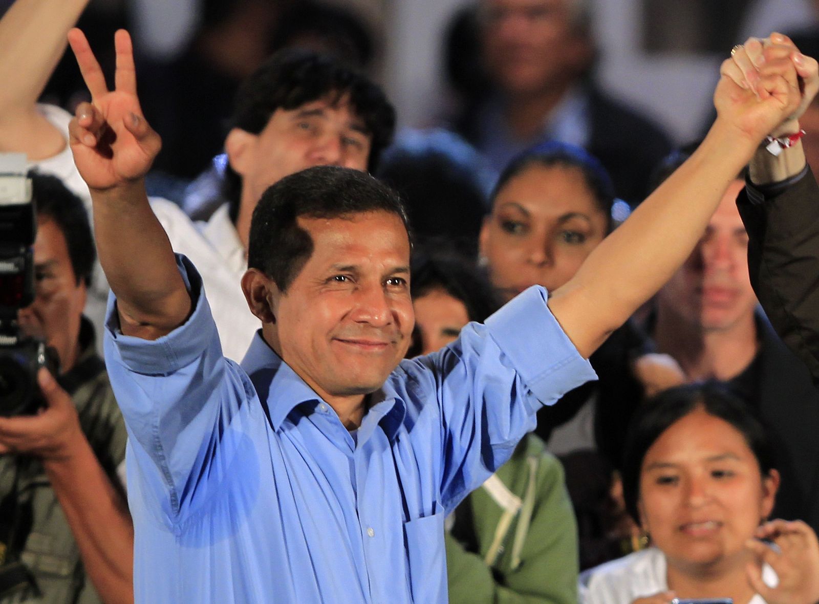 Peru's presidential candidate Humala greets supporters at the end his closing campaign rally in Lima